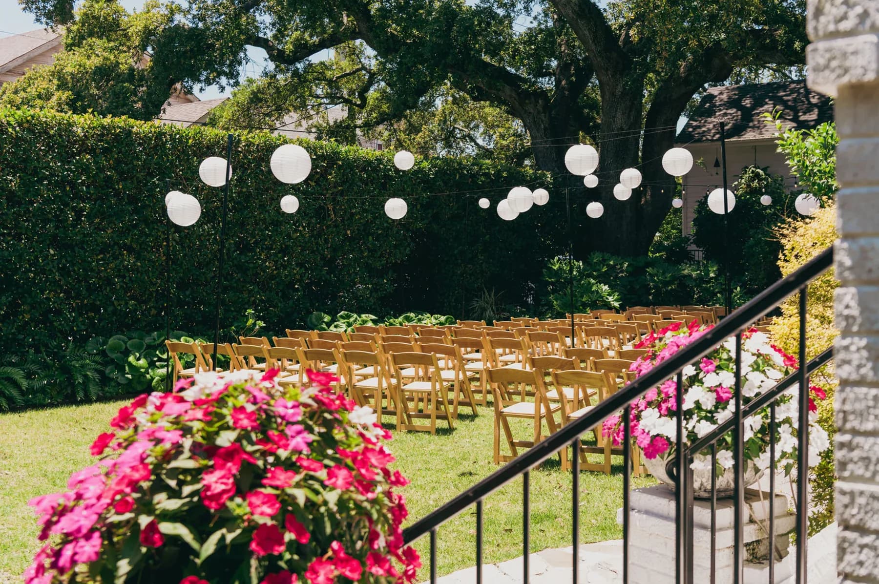 An outdoor wedding ceremony in the cottage yard at The Mazant