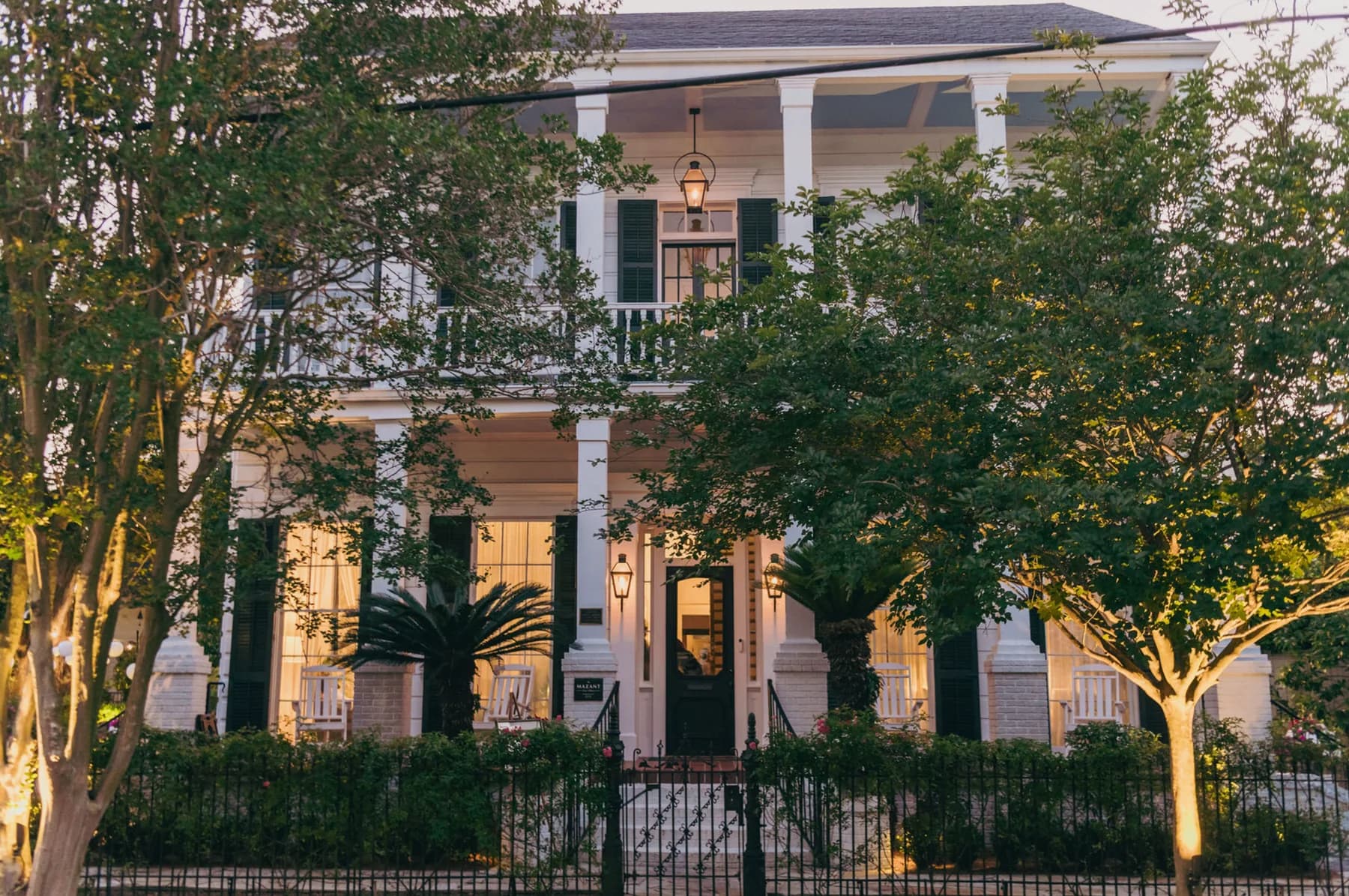 The Mazant illuminated at dusk in New Orleans