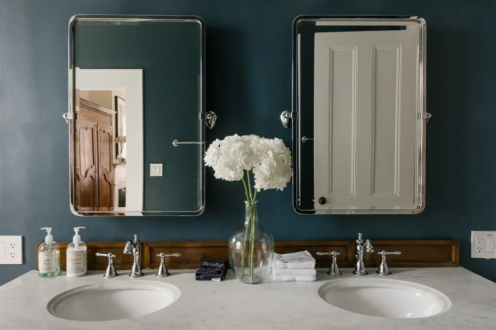 Bathroom with dark tile detail