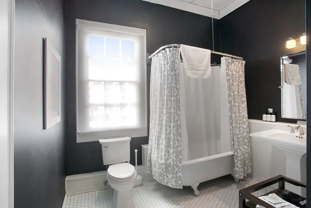 Bathroom with tub and vanity